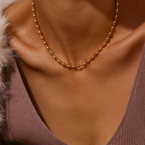 Elegant 4mm gold plated stainless steel oval bead chain necklace for women on a model