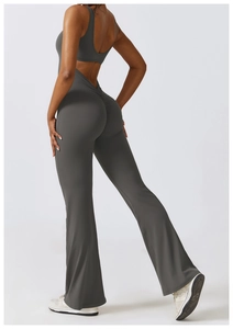 Detail of high waist charcoal grey yoga bodysuit with scrunch butt and flare leg design