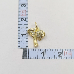 Detailed measurement of gold palm tree pendant with micro-pave cubic zirconia crystals