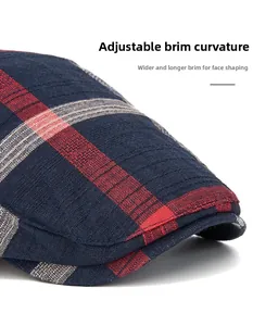 Macro detail of the curved plaid visor showing premium woven texture and wide brim