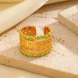 Vintage golden stainless steel ring with green enamel sunflower and multi-layered design