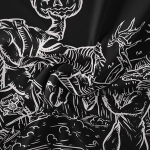 Macro shot of Halloween gothic tapestry fabric with high-contrast skeleton and rose patterns