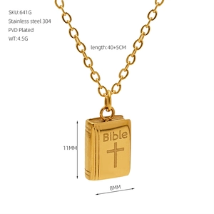 Detail view of 18K gold plated stainless steel Bible book pendant with size specifications