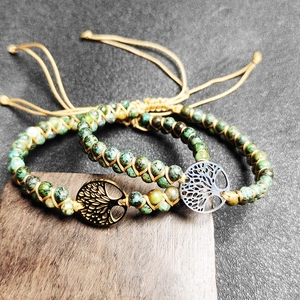 Handmade African turquoise beaded bracelets with tree of life charms on wood block