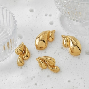 Modern layered teardrop earrings in polished gold stainless steel for a luxury look