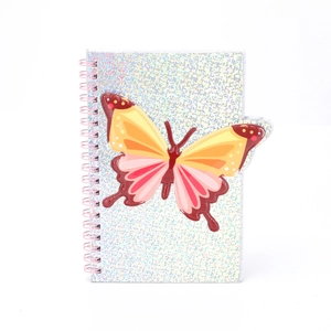 Holographic glitter spiral notebook featuring a 3D yellow butterfly and pink wire coil