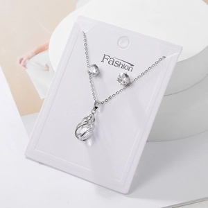 Silver hollow teardrop necklace and earring jewelry set with sparkling zircon stones