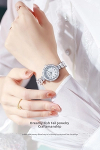 Elegant mermaid tail watch with mother of pearl dial and sparkling zircon rings