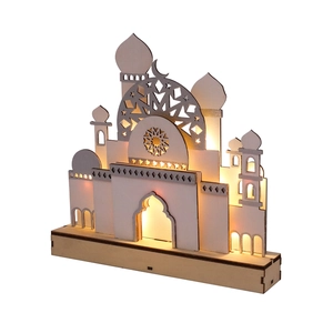 Detail of wooden LED moon lamp featuring intricate Islamic cutout patterns and warm glow