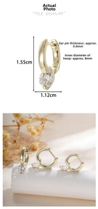 Detail of gold U-shaped earrings with gem, 0.8mm pin and 8mm inner diameter size