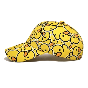 Close-up of the cartoon yellow duck print pattern and durable cotton twill fabric on the cap