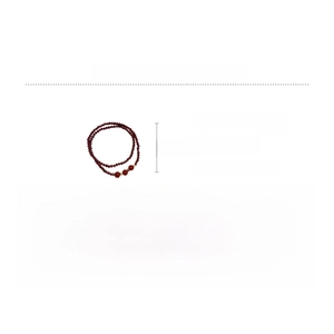 Detail view of double-layer garnet beaded bracelet with gold copper charms and size specs
