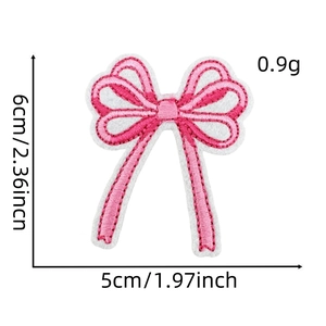 Pink embroidered bow patch for hair clips and clothing showing 6x5cm product dimensions
