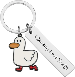 Close-up of duck keychain with I Ducking Love You text engraving and cartoon duck charm
