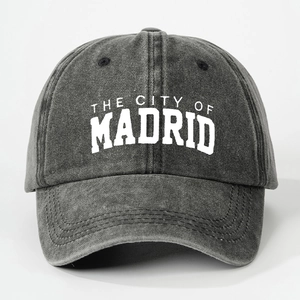 Washed dark grey cotton baseball cap featuring white The City of Madrid embroidery