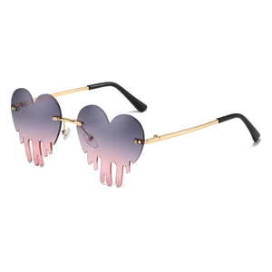 Fashionable heart-shaped sunglasses with gradient purple lenses and gold metal frames