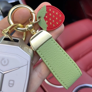 Creative strawberry leather keychain with green hand strap and golden ring for car keys