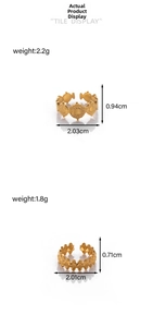Detail view of golden stainless steel rings with sunburst and geometric pattern dimensions