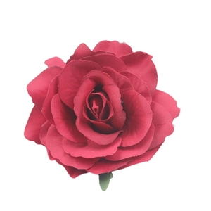 Deep red artificial rose hair clip with realistic fabric petals on white background