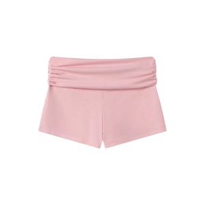 Detailed view of pink modal shorts featuring lace trim and folded waist with side ruching