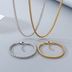 Ensemble collier et bracelet en maille épi d'acier inoxydable poli en coloris or et argent