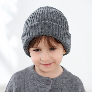 Warm grey ribbed knit beanie hat for children and infants with a cozy winter design