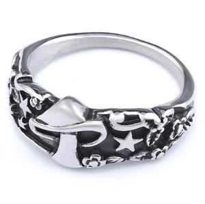Vintage stainless steel ring with 3D engraved mushroom and star patterns on white background