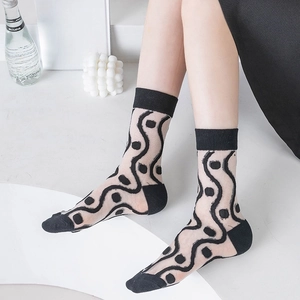 Sheer black polka dot mesh socks with wavy stripes and reinforced heels for women