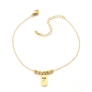 Elegant gold titanium steel anklet featuring a number 7 pendant and delicate beads detail