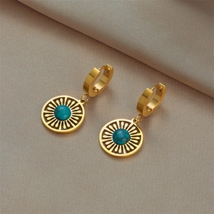 Vintage golden hollow circle drop earrings with turquoise stone in sunburst design
