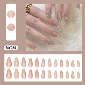 Almond shaped MY085 cat eye press-on nails in dusty rose with glossy and glitter finish