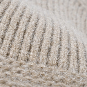 Winter oversized knit beanie for men and women featuring warm ribbed wool texture