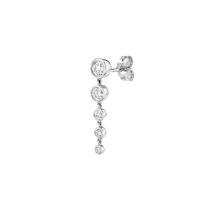 Detailed close-up of silver drop earrings with five graduated sparkling zircon stones