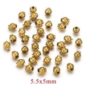 Macro view of 5.5x5mm textured gold stainless steel beads for DIY jewelry making