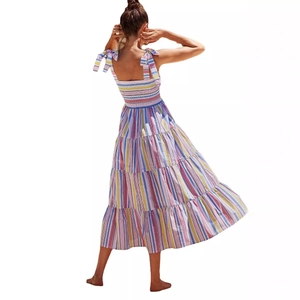 Women's colorful striped maxi dress with tiered cake skirt and tie straps back view