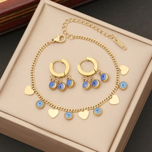 Gold-plated stainless steel jewelry set with blue evil eye and heart charms