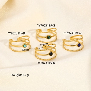 Detail of 18K gold stainless steel multi-layer open rings with colorful natural stones