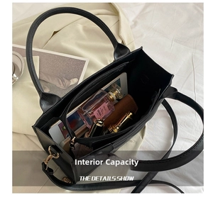 Interior view showing large capacity and compartments of this black matte tote bag