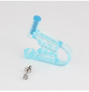 Detailed view of blue disposable ear piercing gun tool with a silver stud earring