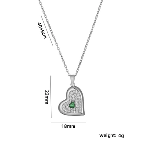 Elegant emerald green heart pendant necklace with shimmering zircon stones on silver chain