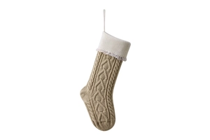 Close-up of khaki knitted Christmas stocking with white cuff and heart tassels