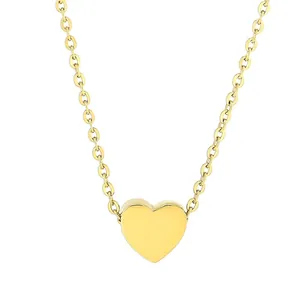 Minimalist gold heart pendant necklace with polished mirror finish and delicate cable chain