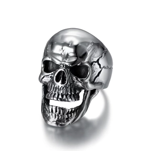 Vintage stainless steel skull ring for men with cracked texture and polished silver finish