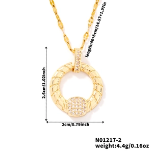 Detail of gold necklace with zircon circle pendant showing dimensions 2.6x2cm and length