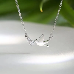 Elegant S925 sterling silver dove necklace with sparkling white zircons on minimalist chain