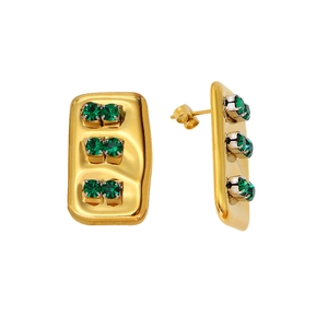 Detailed macro view of gold-plated rectangular earrings set with green zircon stones