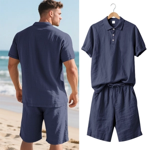 Detail of navy blue linen polo and drawstring shorts set with breathable waffle texture
