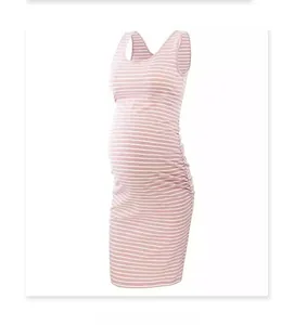 Detail view of pink and white striped maternity dress with side ruching and round neck