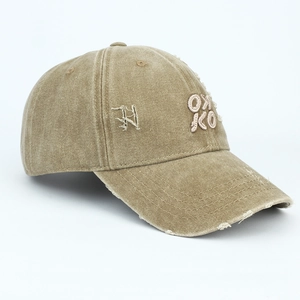 Vintage washed khaki baseball cap with distressed holes and OK KO embroidery