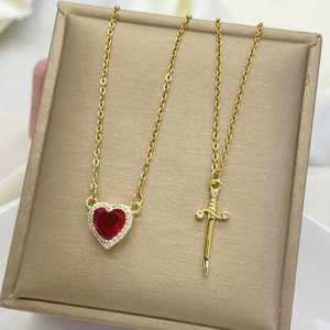 Titanium steel necklace set featuring a red heart pendant and a golden sword with zircon